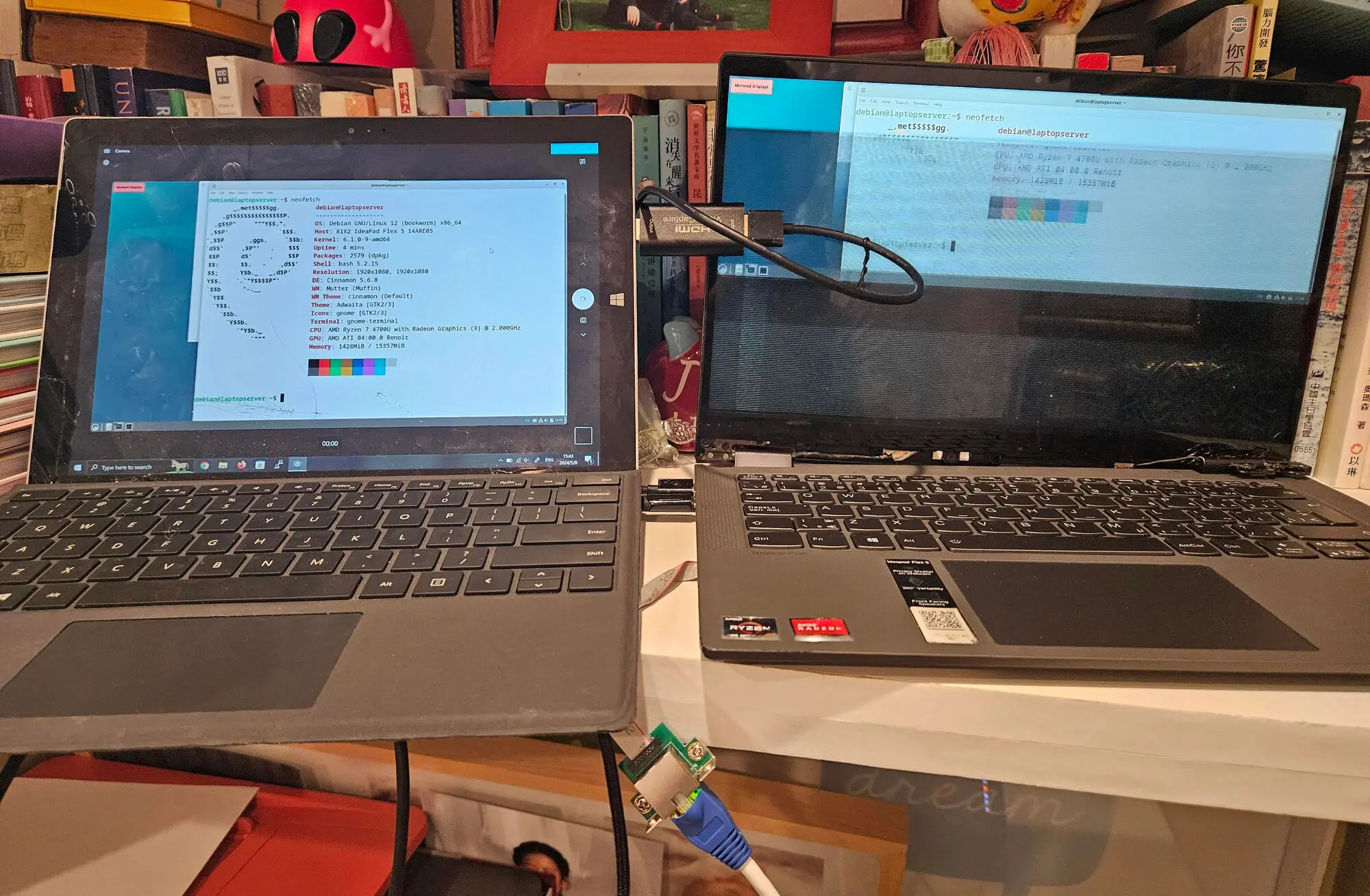 Laptop with flickering display running Debian with HDMI output to another laptop.
